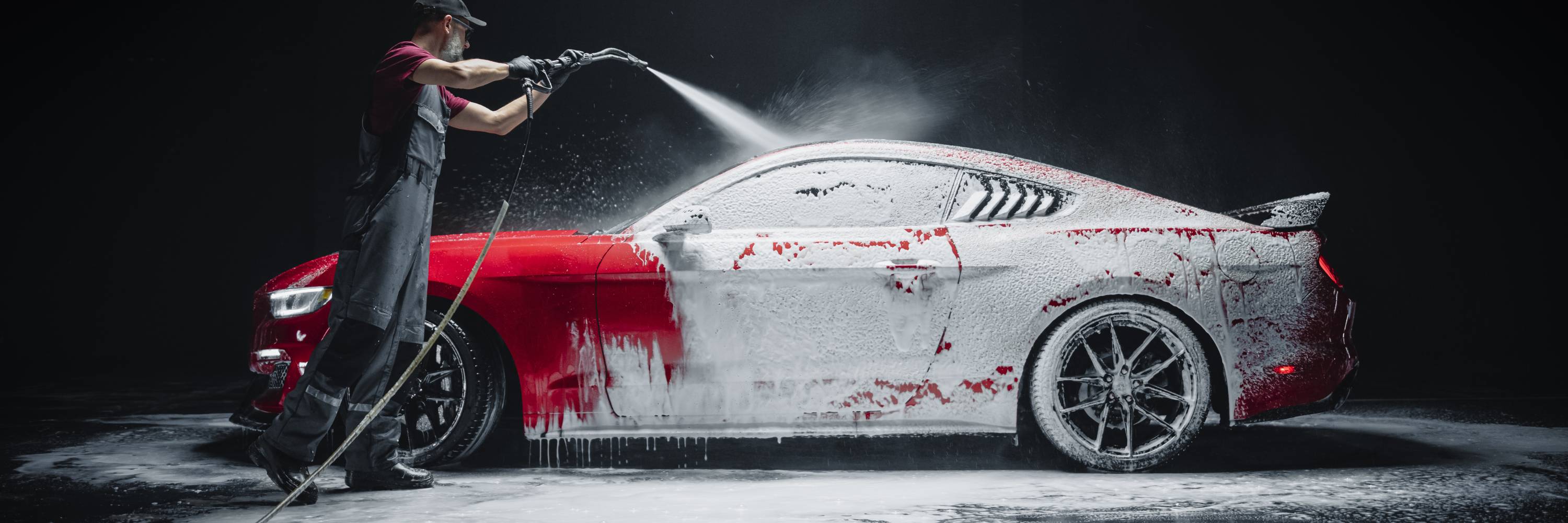 A man cleaning a car